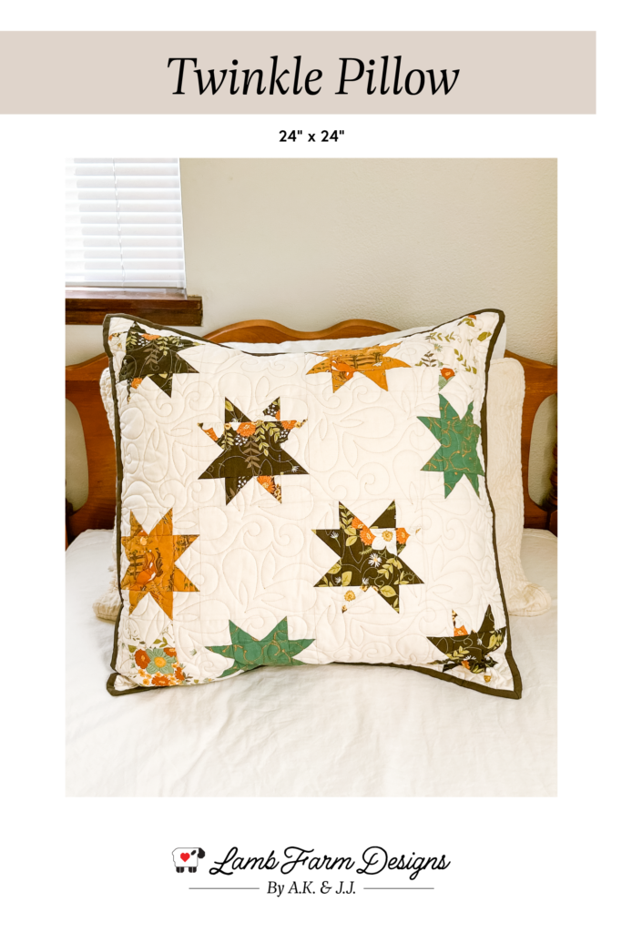 free bonus project from our twinkle quilt: picture is our pattern cover featuring an image of the pillow with 10 large quilt stars. Title is "Twinkle Pillow, 24"x24", by Lamb Farm Designs by A.K. & J.J."